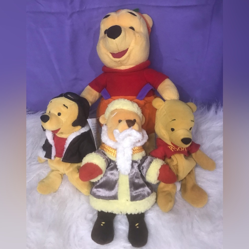 Set of 4 Disney Winnie the Poohs